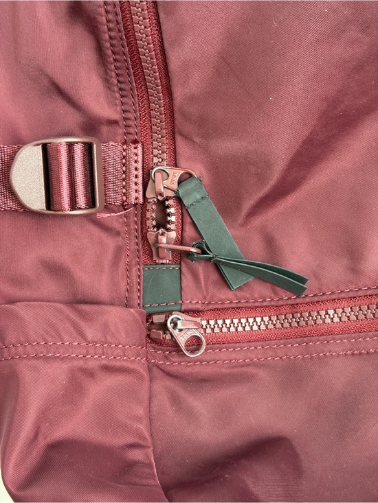 Lululemon New Crew Backpack 22L in the deep red Merlot colorway